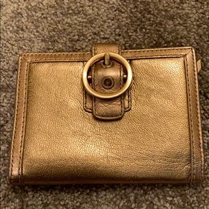 Gold coach wallet! 7 card slots and cash area
